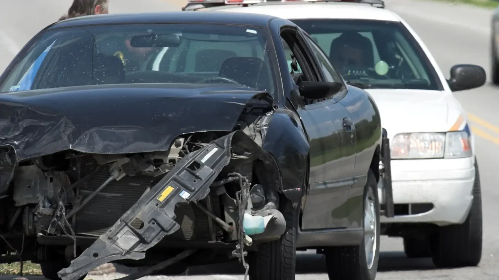 Severe car accident—damaged black vehicle