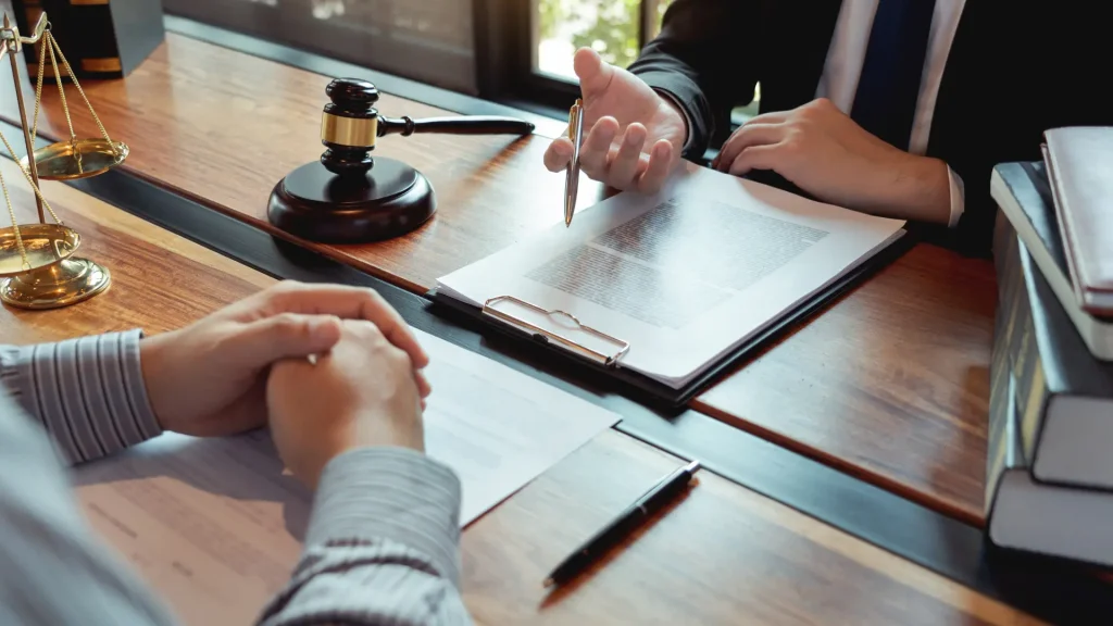 Legal consultation with clipboard and gavel